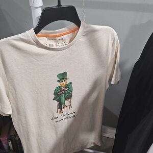 Cream Tee with Green Leprechaun Graphic